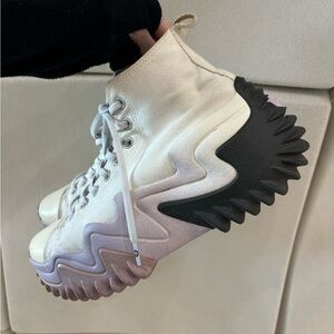 white and black platform converse. cute purple star on back.